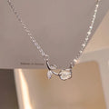 Elegant Tulip Pendant Necklace featuring a silver tulip flower pendant with crystal accents.