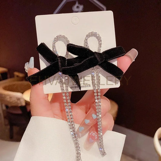 1-pair-fashion-geometric-butterfly-bow-knot-imitation-pearl-alloy-rhinestone-earrings.jpg