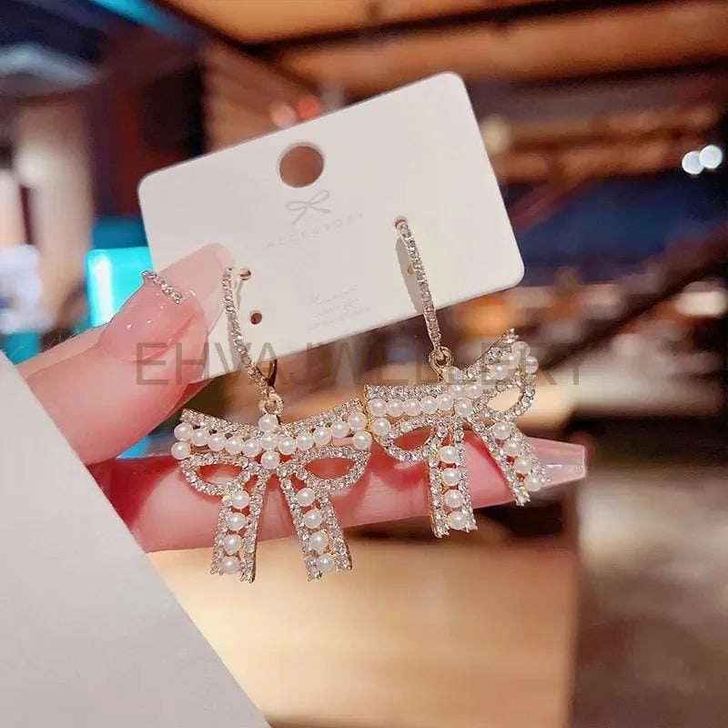 1-Pair-Fashion-Geometric-Butterfly-Bow-Knot-Imitation-Pearl-Alloy-Rhinestone-Earrings-1.jpg