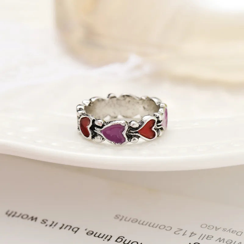 Vintage-Heart-shaped-Dripping-oil-Two-piece-Alloy-Rings-Set-Wholesale-1.webp