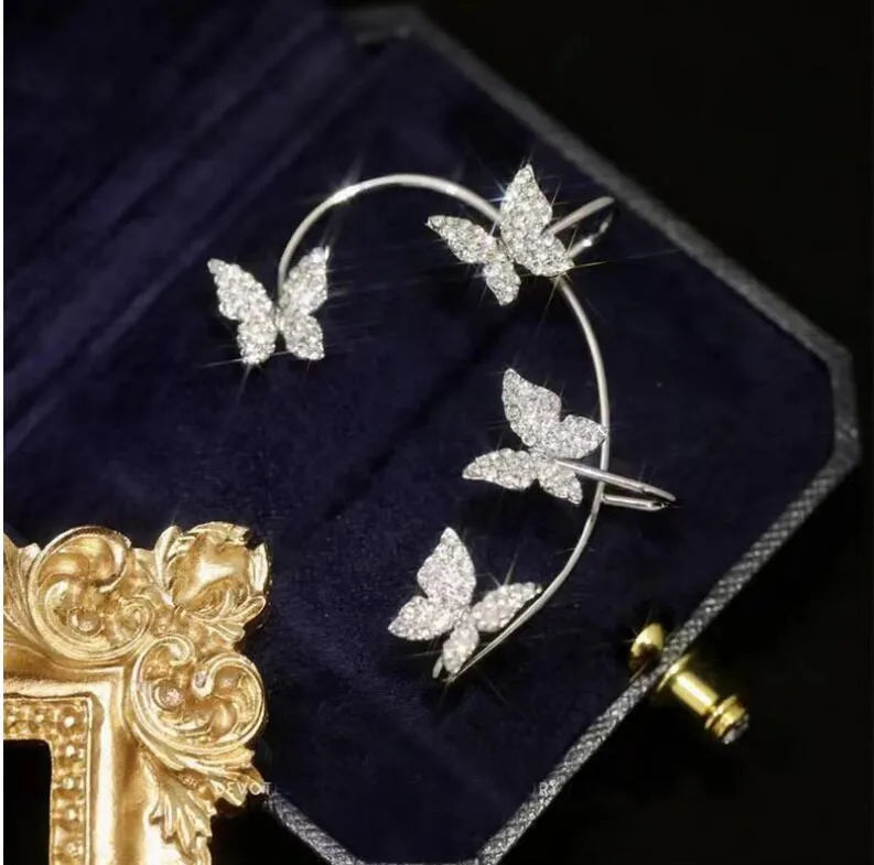 Fashion butterfly Inlay Earcuff (right). Fashion Butterfly Inlay Earcuff right ear with sparkling crystal butterfly design, stylish non-piercing ear cuff for women