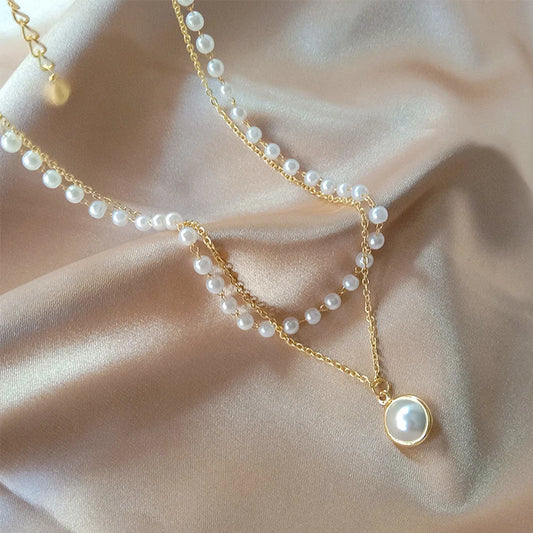 Stylish pearl bracelet – double layer imitation pearls with gold plated alloy chain jewellery India
