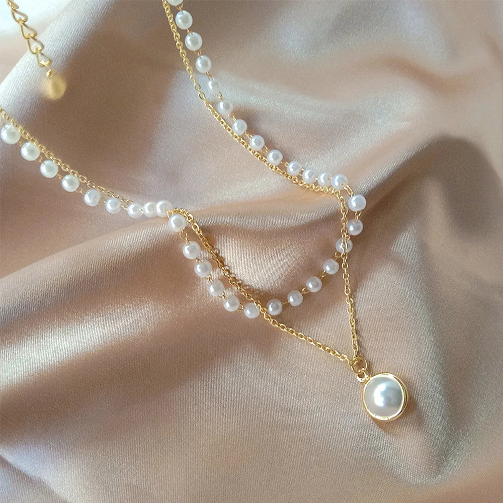 Stylish pearl bracelet – double layer imitation pearls with gold plated alloy chain jewellery India