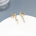 Butterfly Bowknot Earrings in gold with delicate ribbon twist and rhinestone detailing