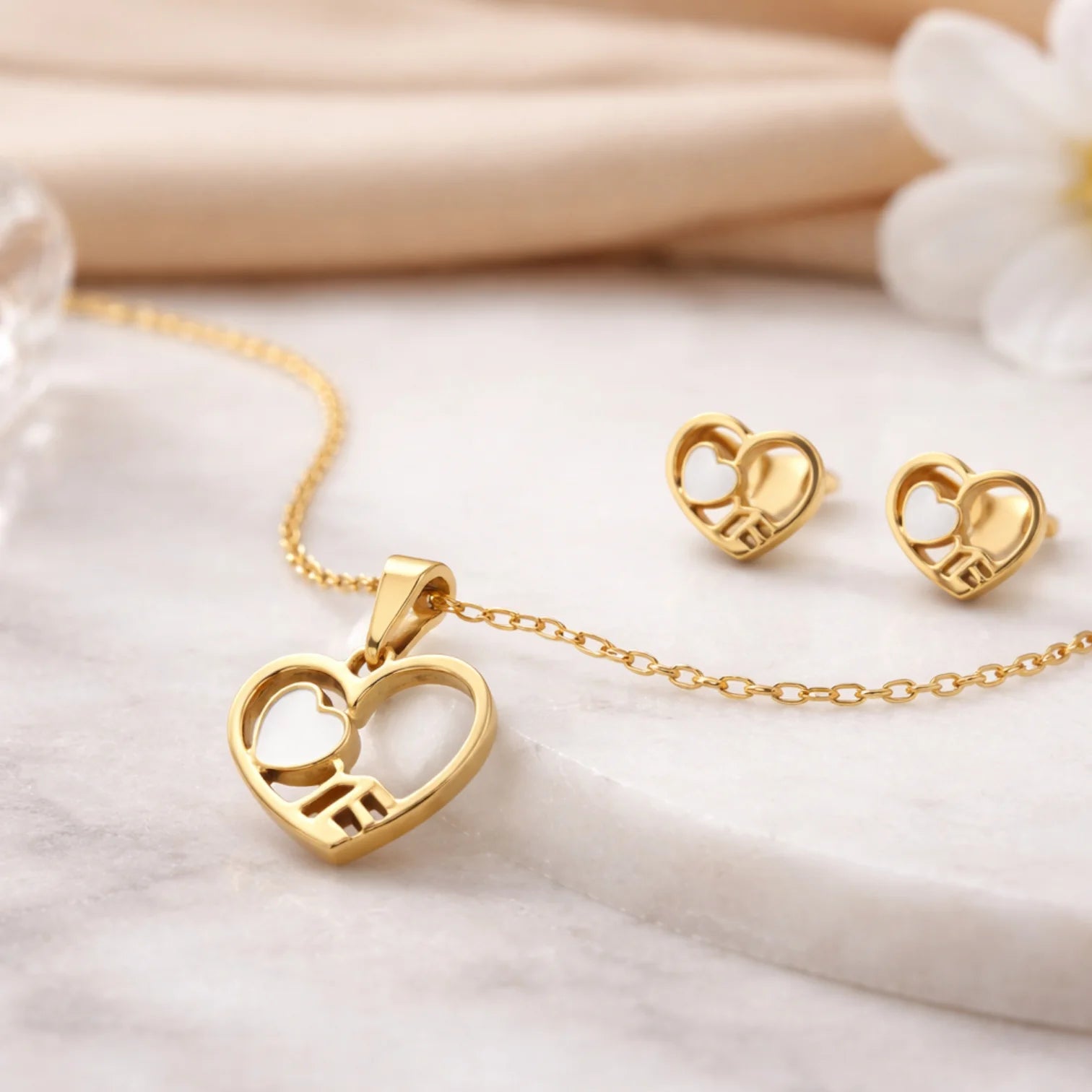 Eternal Love Heart Pendant Set. Gold heart pendant necklace with matching heart stud earrings for women