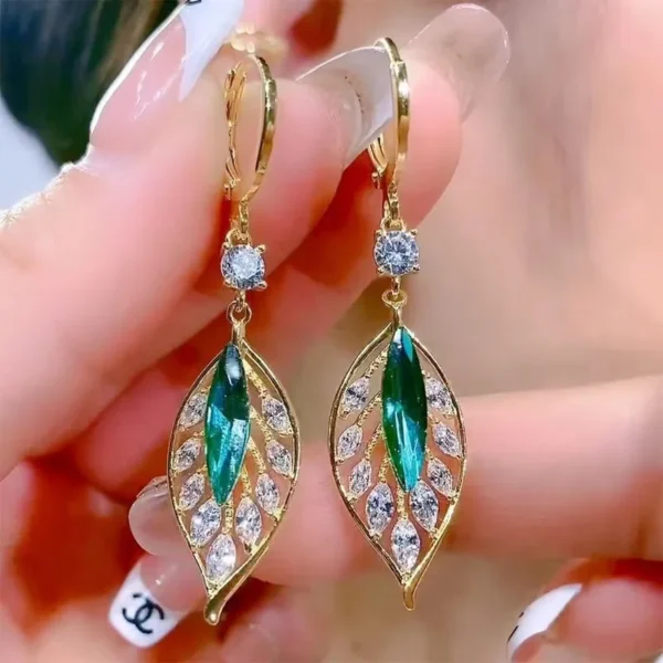 Peacock Earrings with gold leaf design and crystal accents – elegant dangler earrings for women