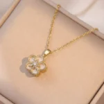 Golden flower Leaf Rotating Pendant Necklace